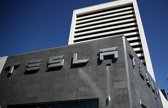 特斯拉和雄韬股份签约